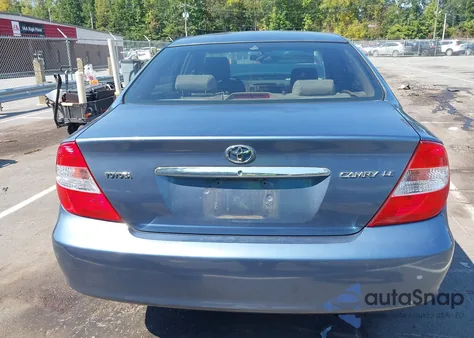 2003 Toyota Camry Le z USA, uszkodzony, nr VIN 4T1BE32K73U660930